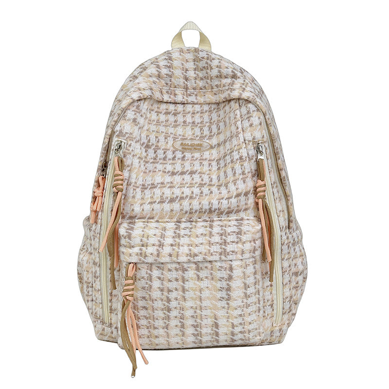Versatile women's lightweight fashion backpack, textured for a modern look, ideal for travel or casual daily use.