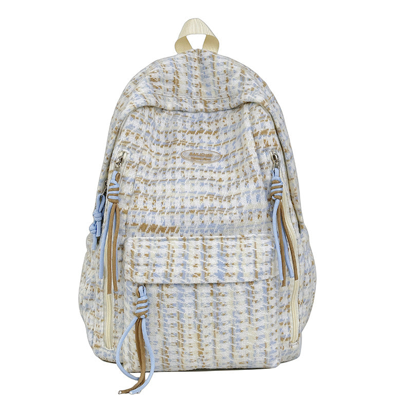 Durable women's lightweight textured backpack for daily carry. A fashionable, casual bag for essentials & travel.