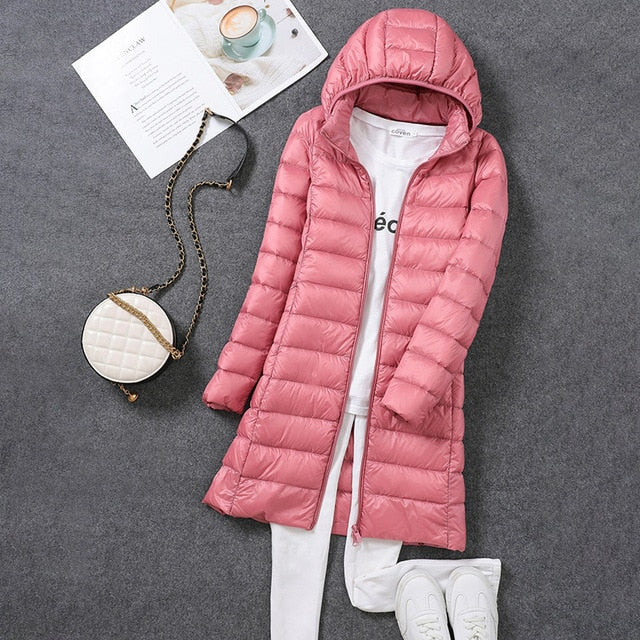 Trendy women's long puffer jacket with a detachable hood, perfect for stylish women's fashion & everyday wear.