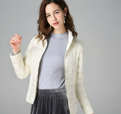 Comfortable & stylish women's long-sleeve quilted puffer jacket. Warm outerwear, ideal for fall & winter fashion.