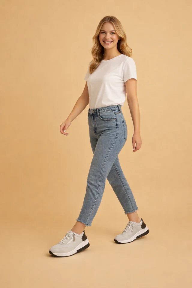 Everyday women's low-top comfort shoes: perforated for air flow, cushioned for walks. A stylish, casual footwear choice.