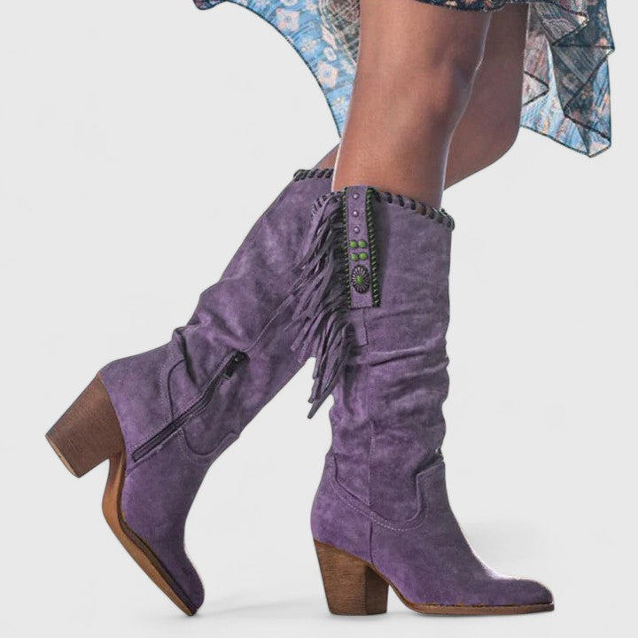 Trendy women's mid-calf fashion boots with playful fringe and a sturdy block heel for casual wear.