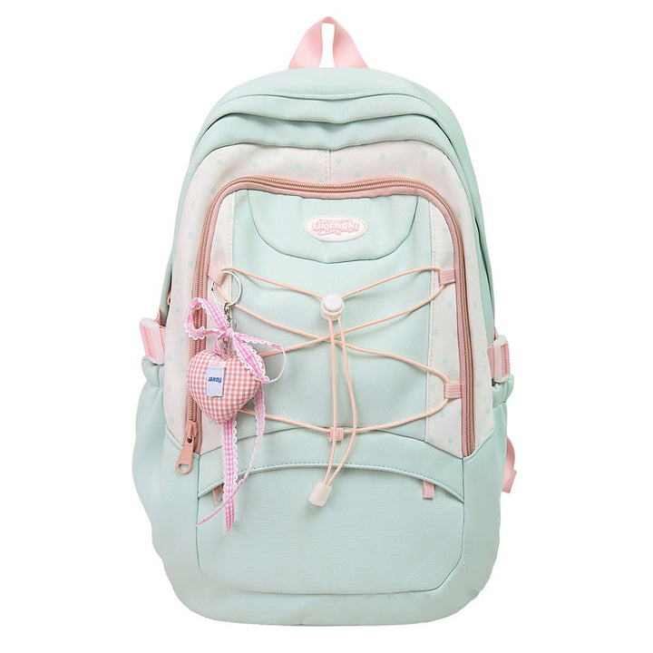 Organized women's multi-compartment backpack, perfect for carrying essentials for work, school, or travel.