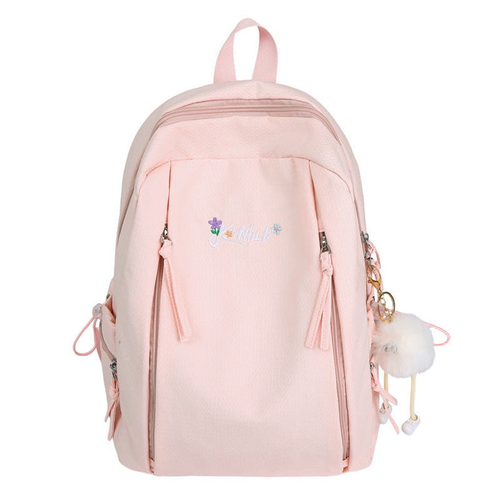 Women's functional travel backpack with multiple compartments & pockets for organized packing & daily essentials.