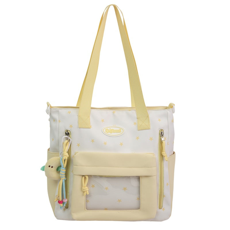 Versatile women's fashion tote bag with charming design & multiple pockets for organized daily essentials.
