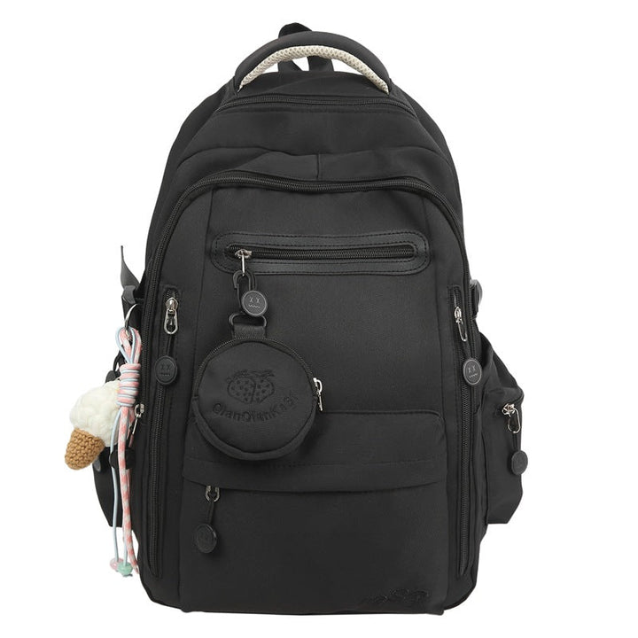 Chic women's multi-pocket travel backpack for school or daily commute. Features laptop sleeve & durable construction.
