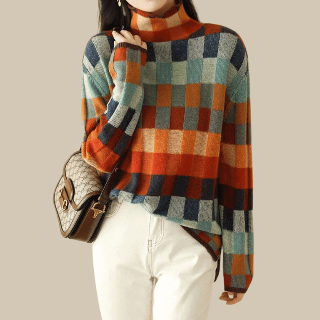 Stylish women's orange patchwork turtleneck sweater, a cozy long-sleeve knit perfect for versatile winter fashion.
