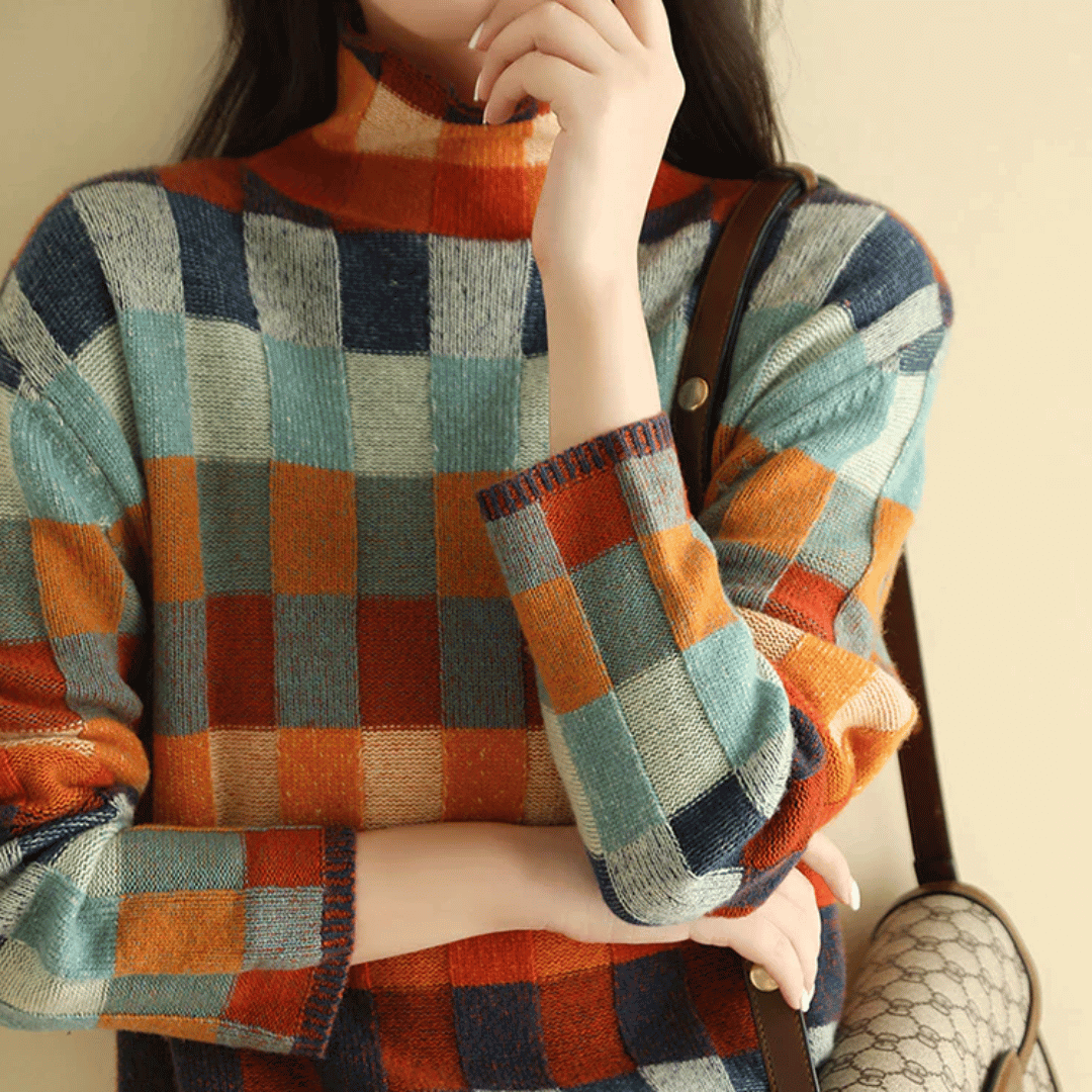 Versatile women's patchwork turtleneck sweater in orange, a comfortable long-sleeve knit for stylish winter outfits.