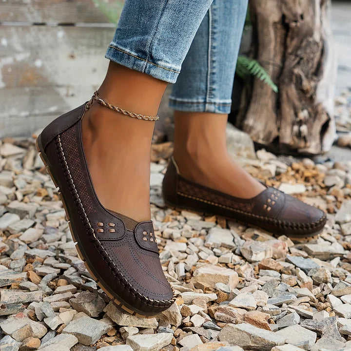 Side profile of stylish women's slip-on flats, showcasing orthopedic design & comfort.