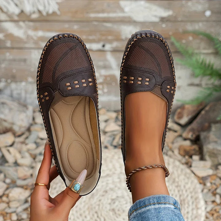 Women's walking shoes with orthopedic comfort, easy slip-on design for stylish everyday wear.