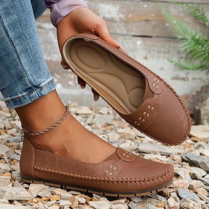 Front view of women's comfortable orthopedic slip-on shoes, ideal for daily walking.