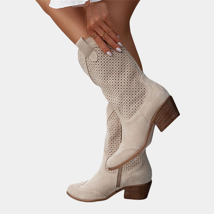 Durable women's orthopedic cowboy boots designed for all-day comfort, arch support, and western style.