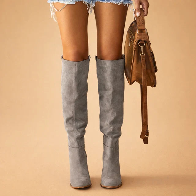 Fashion-forward women's tall Western boots with stiletto heel, over-the-knee design for a bold statement.