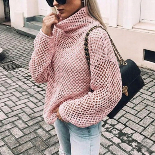 Chic women's oversized chunky turtleneck sweater in a modern knit. A stylish and warm casual jumper.