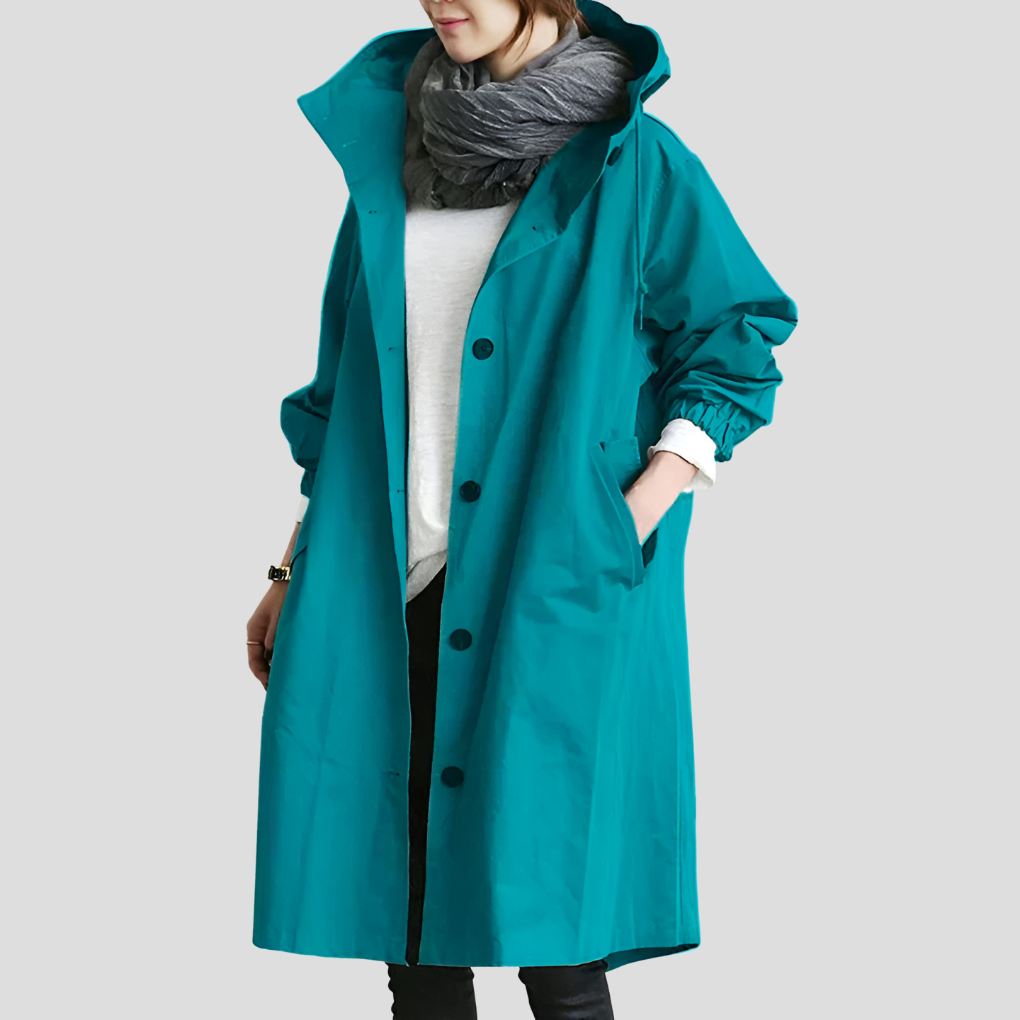 Lightweight women's oversized hooded raincoat. Stylish, waterproof & comfortable all-season outerwear fashion piece.