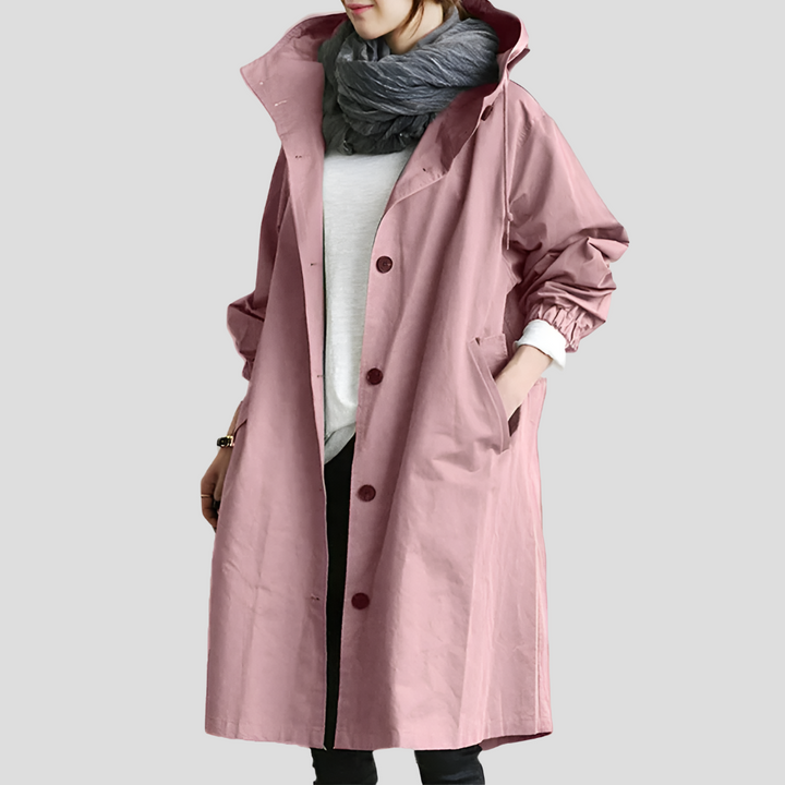 Women's stylish oversized hooded raincoat. Trendy, waterproof, and lightweight all-season fashion outerwear.