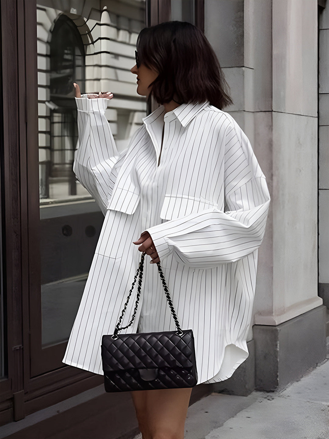 Chic & comfortable women's oversized striped shirt dress, a stylish long-sleeve option for everyday wear.