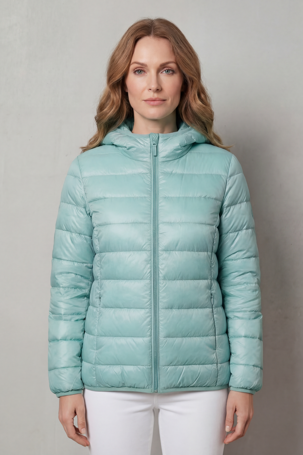 Durable waterproof women's all-weather coat, designed for effective layering in any weather.