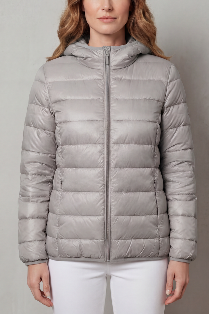 Stylish & waterproof women's all-weather layering coat, versatile for travel & everyday.