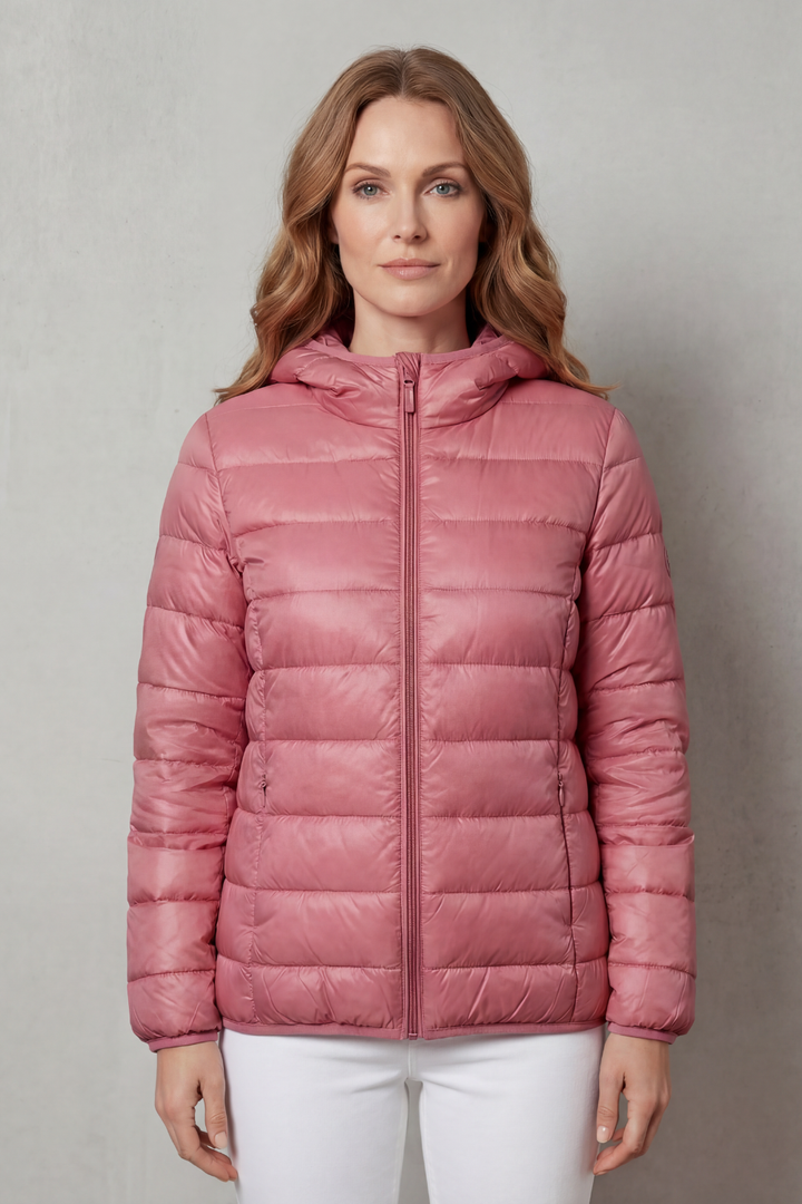 Women's black all-weather waterproof layering coat, offering full protection and style.