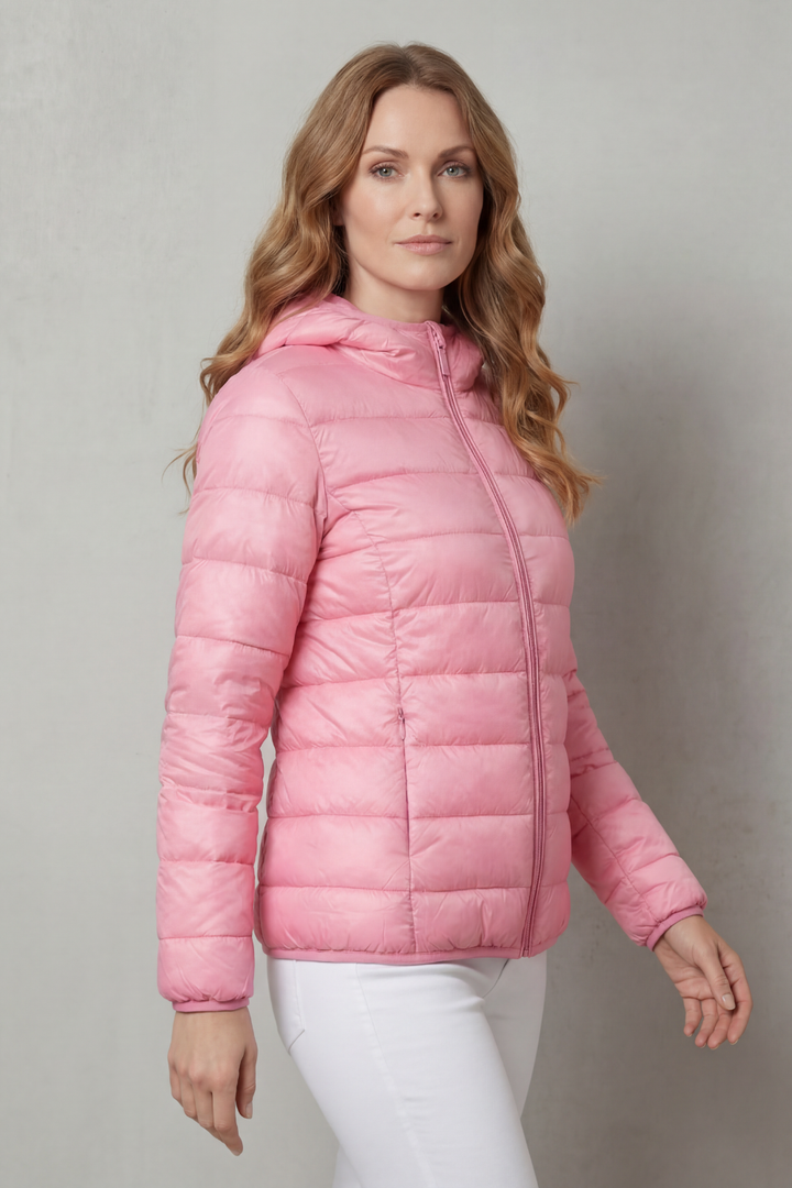 Elegant gray women's rain jacket, offering stylish waterproof protection & layering.