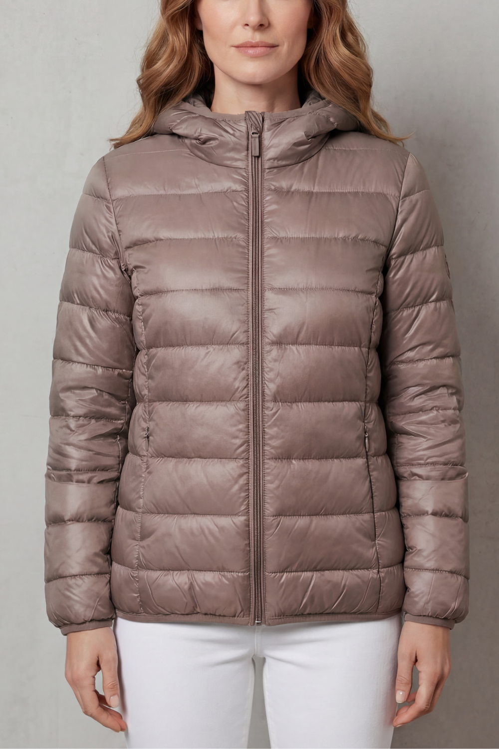 Women's all-weather waterproof layering coat, designed for comfort & modern style.