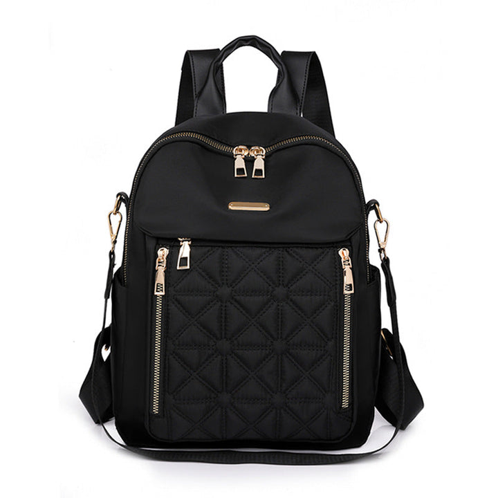 Fashionable multi-compartment quilted backpack for women, a comfortable and durable travel accessory.