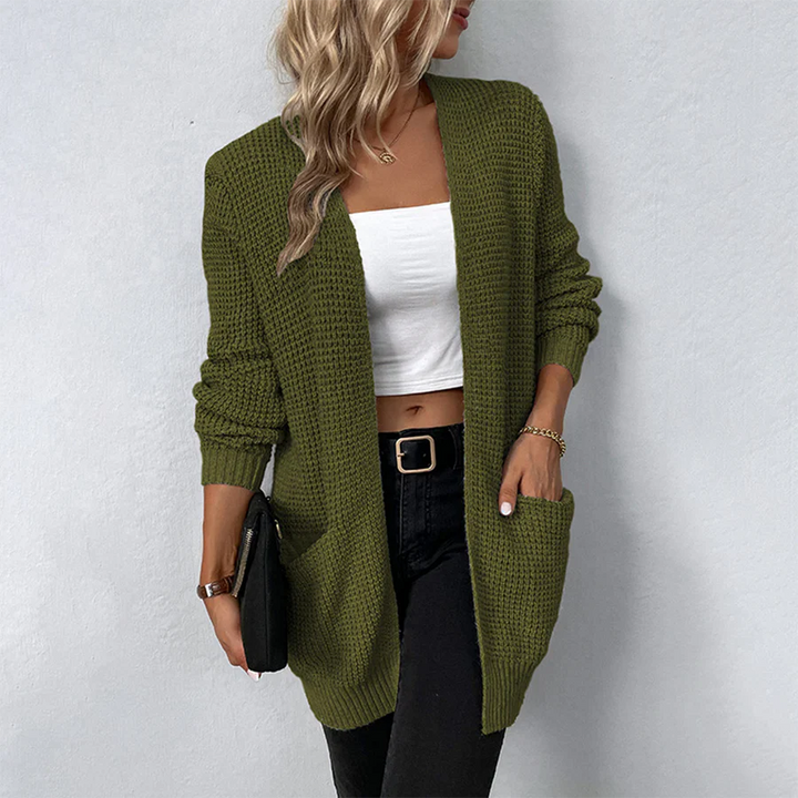 Cozy women's long open-front cardigan with patch pockets. Relaxed fit design ideal for stylish casual wear.