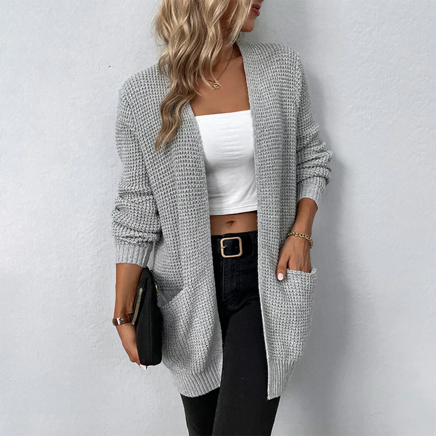 Relaxed fit long open-front cardigan for women. Versatile layering piece, perfect for stylish, cozy casual wear.