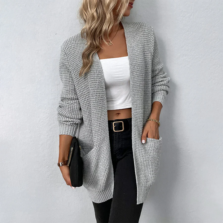 Relaxed fit long open-front cardigan for women. Versatile layering piece, perfect for stylish, cozy casual wear.