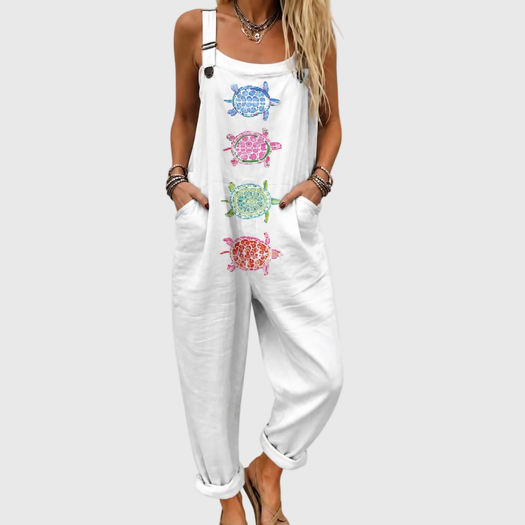 Stylish women's relaxed jumpsuit with a playful marine turtle print. Ideal for comfortable casual wear, summer, and vacation.