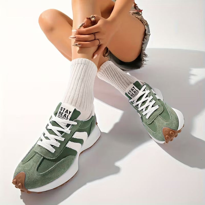 Top view of women's casual shoes, showing the lacing and classic vintage style of these retro sneakers.