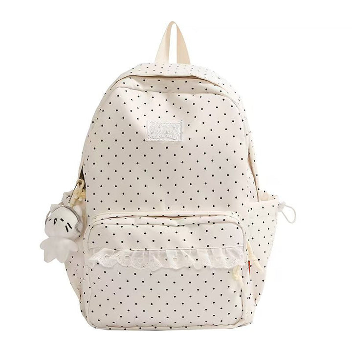 Stylish women's ruffled polka dot backpack, perfect for casual wear, school, or travel. Cute & practical.