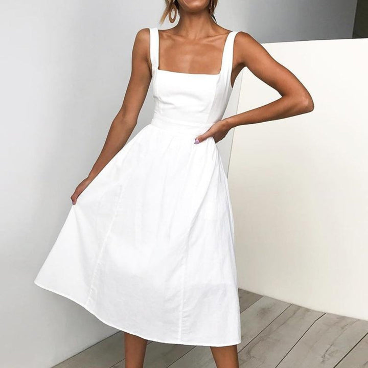 Stylish women's sleeveless midi dress, perfect for summer elegance & versatile casual wear.