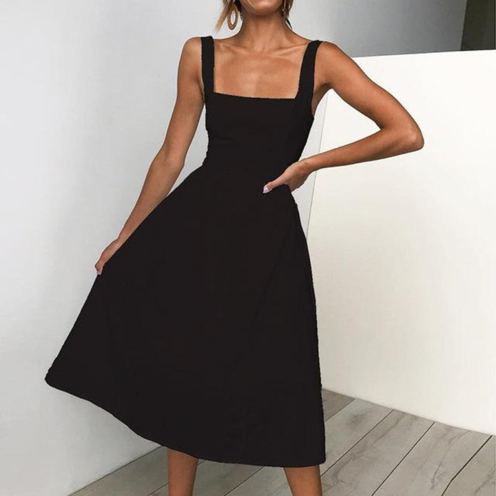 Elegant white sleeveless midi dress for women, featuring a chic square neck. Ideal for summer & vacation.