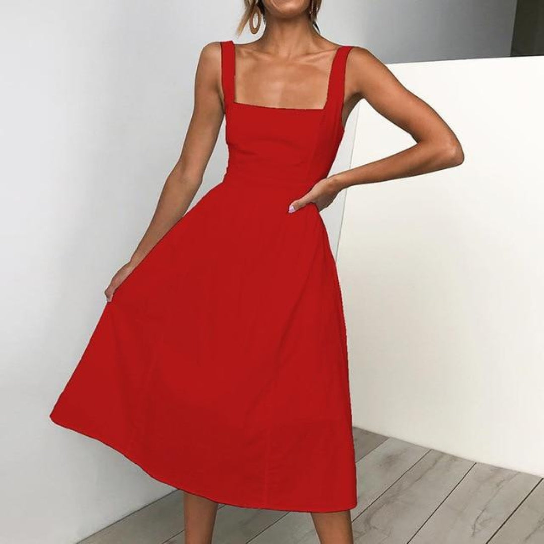 Chic black sleeveless midi dress for women. A versatile & elegant summer fashion piece, perfect for day or night.