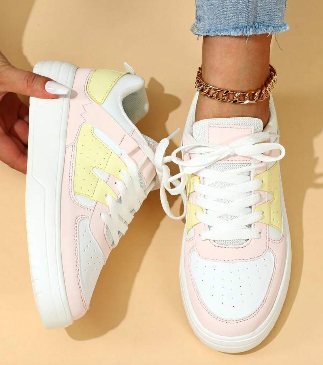 Stylish women's slip-on sneakers in white, perfect for everyday casual wear & active lifestyles.