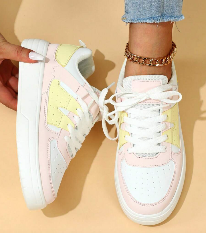 Stylish women's slip-on sneakers in white, perfect for everyday casual wear & active lifestyles.