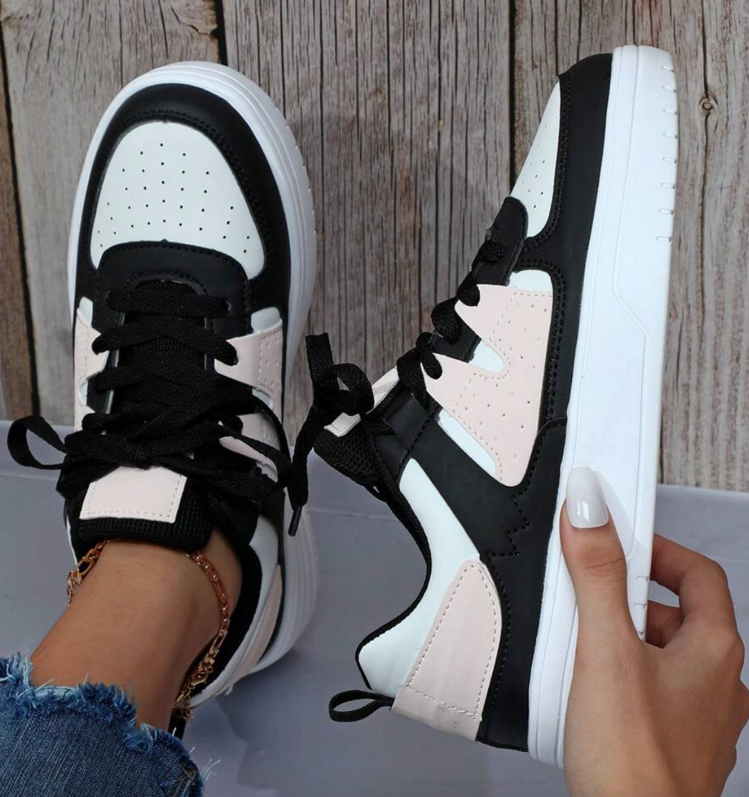 Athletic slip-on women's shoes, combining lightweight design with modern style for active women.