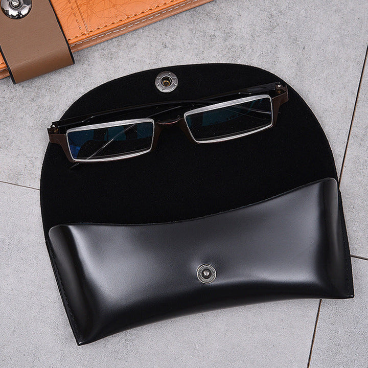 Close-up of elegant synthetic leather women's wallet, showcasing fine texture and slim profile, stylish everyday accessory.