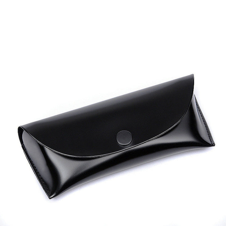 Woman's hand holding a compact synthetic leather wallet, demonstrating its elegant slim design and portability, card holder.