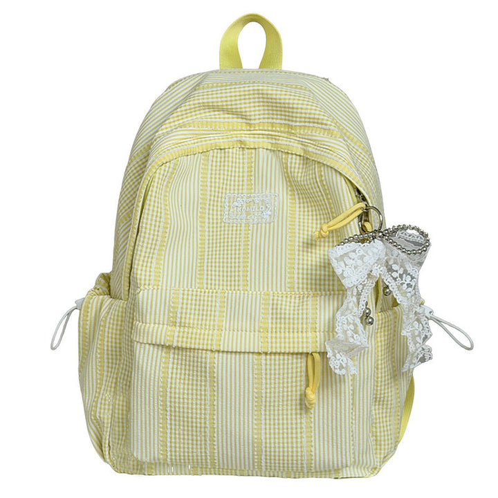 Close-up of a women's modern fashion backpack with unique textured material. Stylish daily accessory.