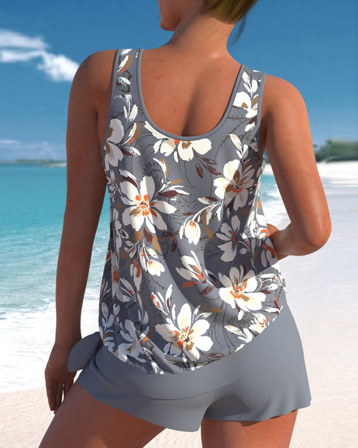Flattering women's tankini two-piece swimsuit for stylish summer beach & poolside vacation wear.