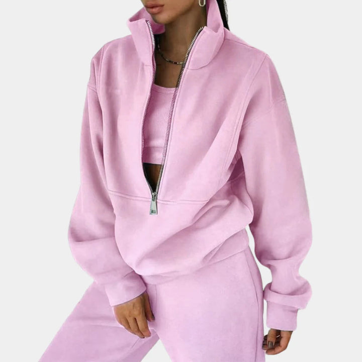 Stylish women's two-piece tracksuit. Comfortable jogger set for casual everyday wear & loungewear. Sporty chic outfit.