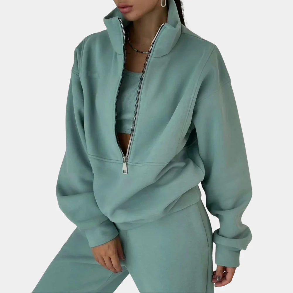 Modern women's two-piece tracksuit set. Comfortable and stylish jogger outfit for everyday loungewear or active looks.