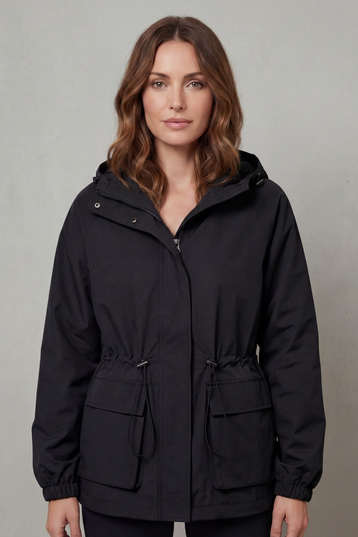 Practical grey women's utility raincoat, waterproof and stylish for everyday lightweight comfort.