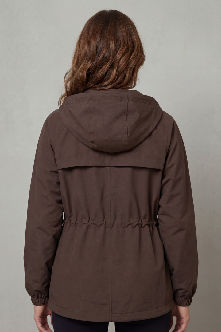 Women's waterproof utility jacket, lightweight design with drawstring waist, versatile for daily spring wear.