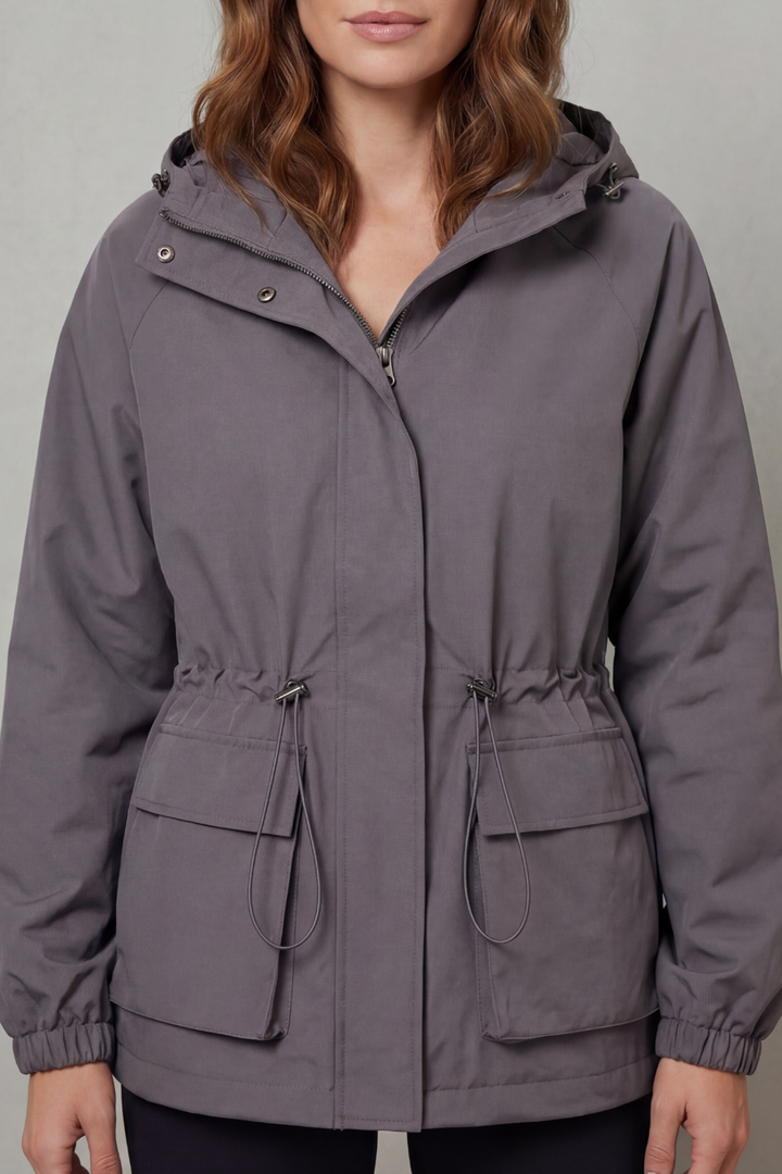 Casual brown women's waterproof jacket, stylish outerwear for everyday use in autumn and spring.