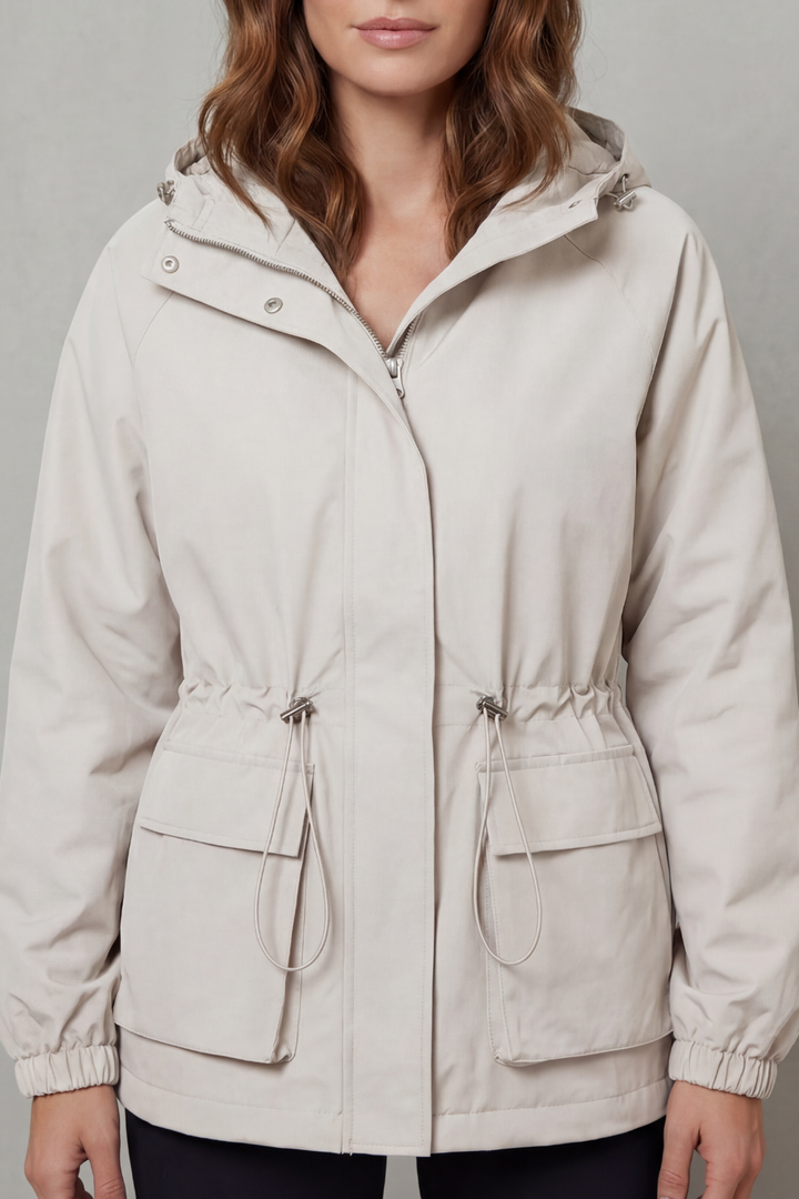 Black women's waterproof raincoat, stylish and lightweight outerwear with practical utility features.