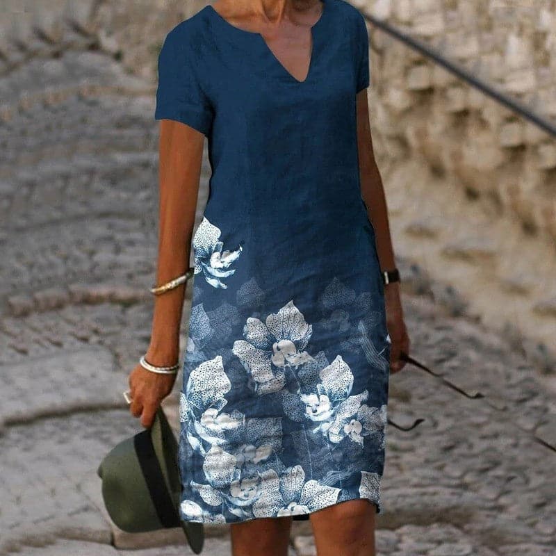 Stylish women's V-neck long sleeve blouse with button design, perfect for versatile everyday fashion.
